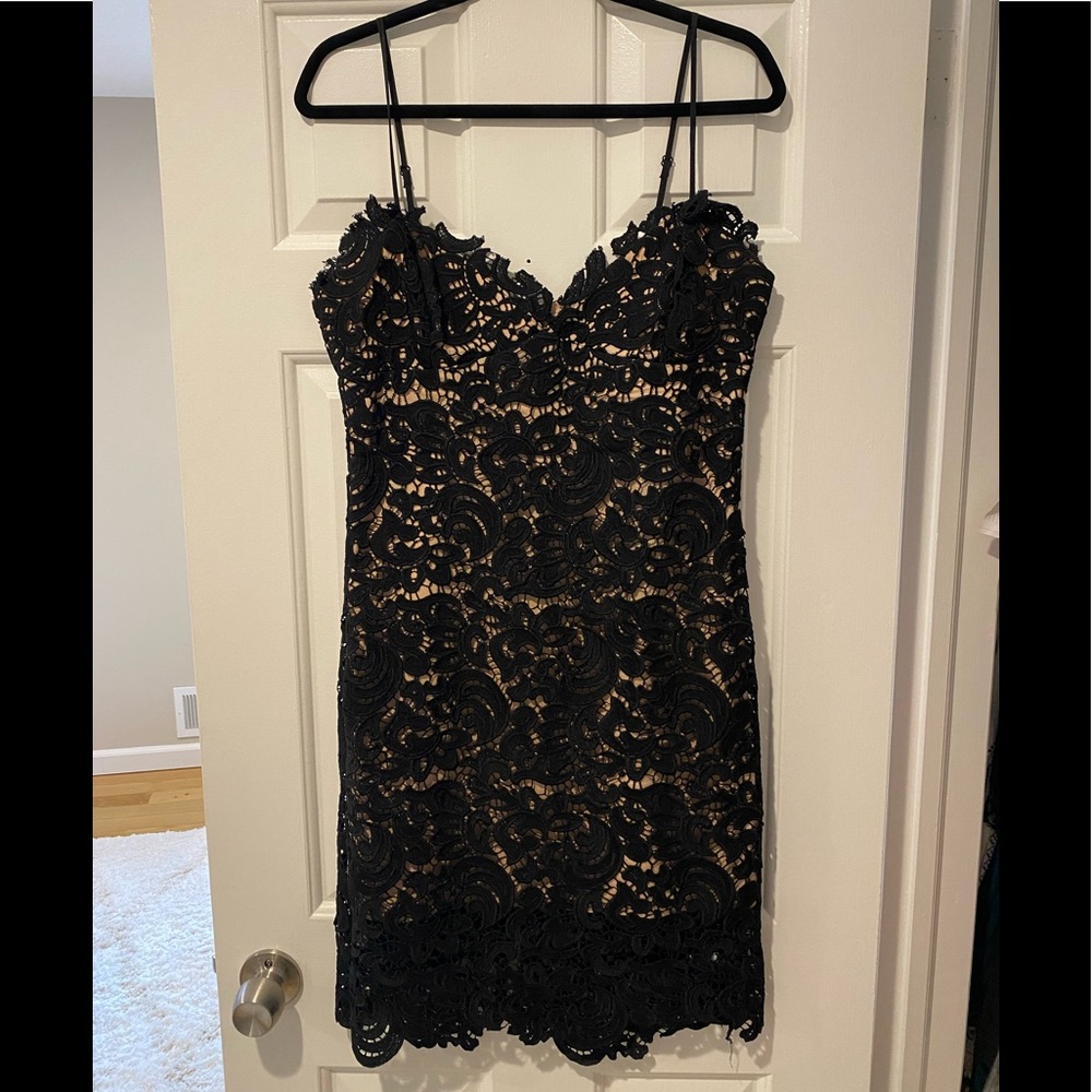 Bardot mini dress, size medium, eyelet black w/ nude slip underneath. Worn once